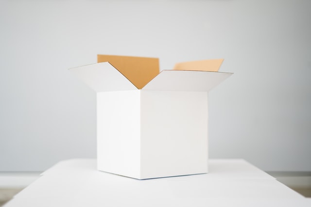 a moving box on a white table